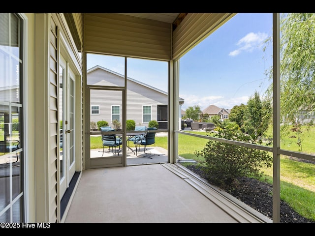 1232 Fence Post Ln, Carolina Shores, NC 28467 - sunroom featuring outdoor dining space