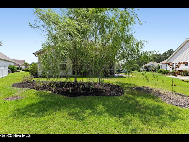 1232 Fence Post Ln, Carolina Shores, NC 28467 - view of green lawn