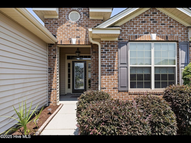 1232 Fence Post Ln, Carolina Shores, NC 28467 - property entrance with brick siding