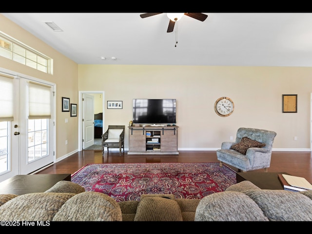 1232 Fence Post Ln, Carolina Shores, NC 28467 - living room with dark wood-type flooring, a ceiling fan, baseboards, and french doors