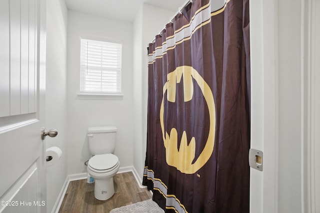 122 Mill Run Loop, South Mills, NC 27976 - bathroom featuring toilet, wood finished floors, baseboards, and curtained shower