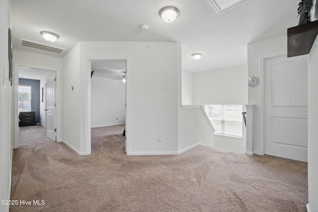122 Mill Run Loop, South Mills, NC 27976 - carpeted spare room featuring attic access, baseboards, and ceiling fan