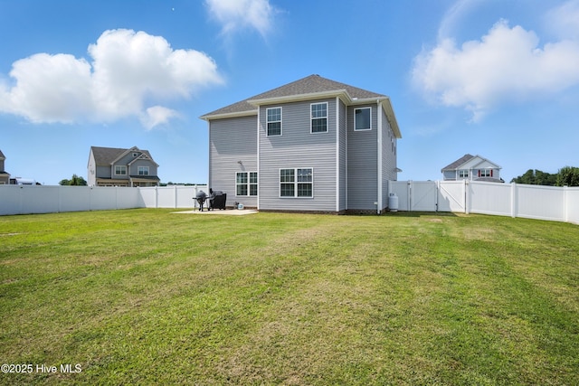 122 Mill Run Loop, South Mills, NC 27976 - back of property featuring a gate and a patio area
