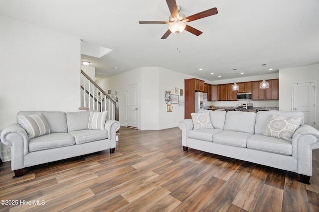 122 Mill Run Loop, South Mills, NC 27976 - living room with a ceiling fan, wood finished floors, recessed lighting, stairway, and baseboards