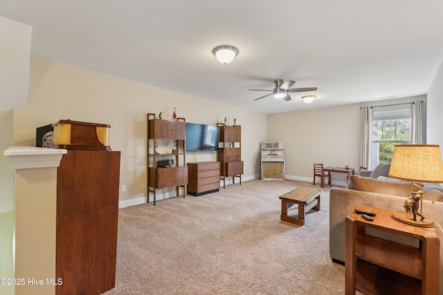 6005 Otter Tail Trl, Wilmington, NC 28412 - carpeted living room with a ceiling fan and baseboards