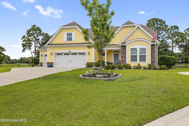 6005 Otter Tail Trl, Wilmington, NC 28412 - craftsman inspired home with driveway, a front lawn, and stone siding