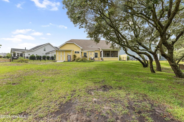 6005 Otter Tail Trl, Wilmington, NC 28412 - rear view of property with a sunroom