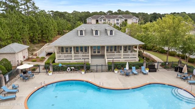 6005 Otter Tail Trl, Wilmington, NC 28412 - community pool featuring a patio area and stairway