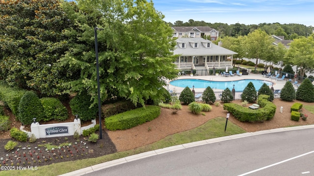 6005 Otter Tail Trl, Wilmington, NC 28412 - outdoor pool featuring a patio
