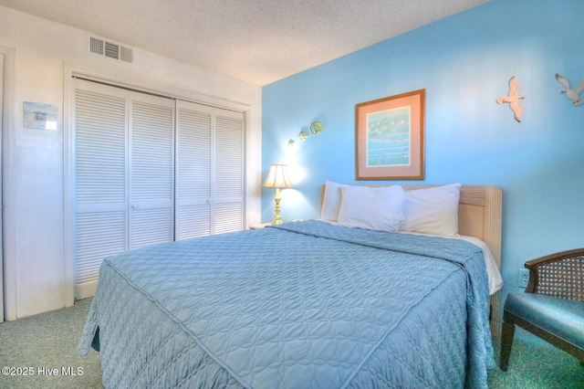 1615 Lake Park Blvd S Unit 307, Carolina Beach, NC 28428 - bedroom with carpet and a closet