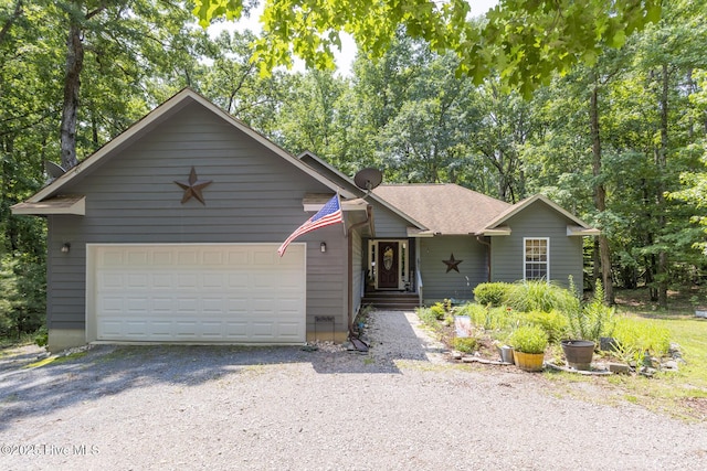 108 Western Trl, Carthage, NC 28327 - view of front facade with driveway and a garage