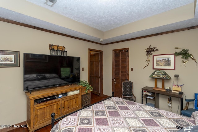108 Western Trl, Carthage, NC 28327 - bedroom featuring a textured ceiling and dark wood-type flooring