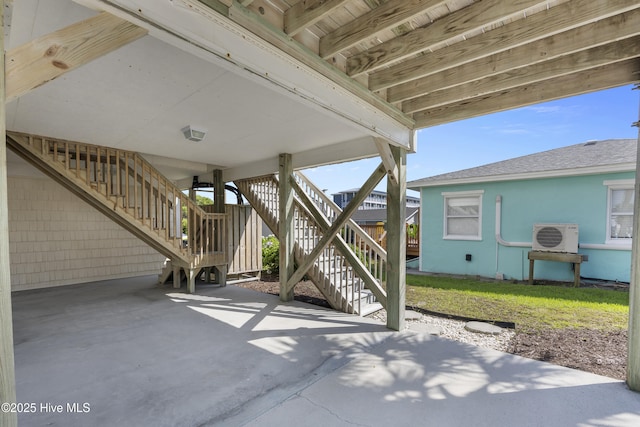 517 N Shore Dr, Surf City, NC 28445 - view of patio / terrace featuring stairs and ac unit