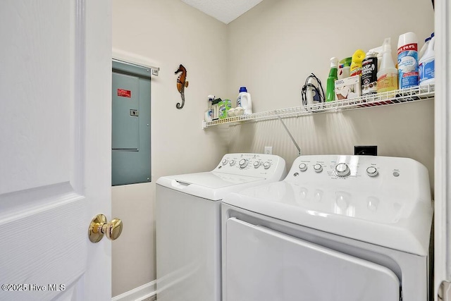 3350 Club Villas Dr # 105, Southport, NC 28461 - washroom featuring electric panel and washer and clothes dryer