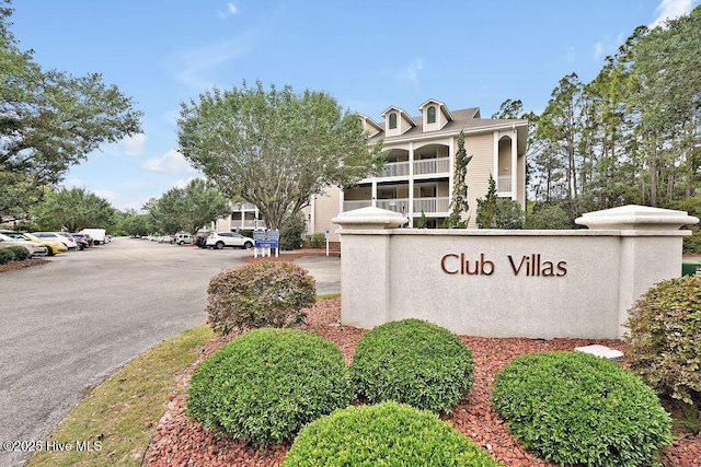 3350 Club Villas Dr # 105, Southport, NC 28461 - community / neighborhood sign with uncovered parking