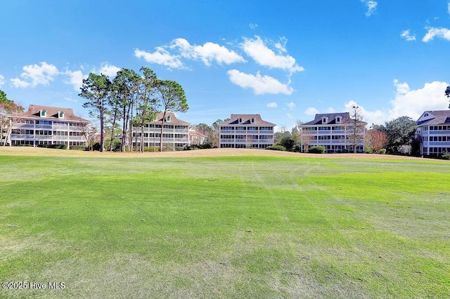 3350 Club Villas Dr # 105, Southport, NC 28461 - view of property's community featuring a yard