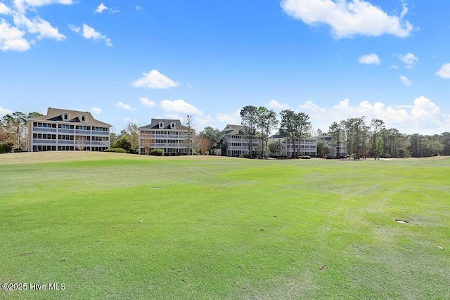 3350 Club Villas Dr # 105, Southport, NC 28461 - view of property's community with a lawn and golf course view