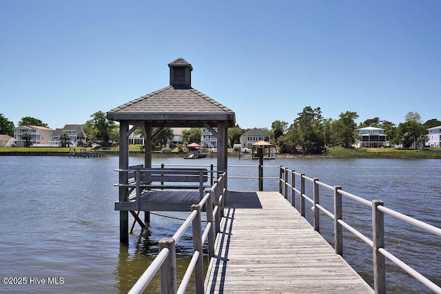 3350 Club Villas Dr # 105, Southport, NC 28461 - dock featuring a gazebo and a water view