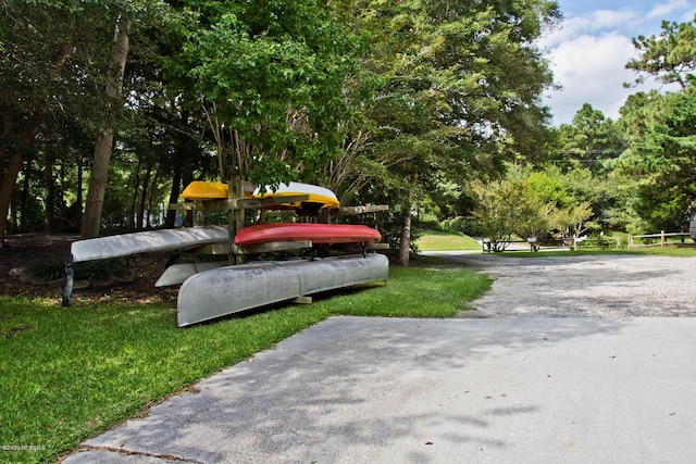 226 Oakleaf Dr, Pine Knoll Shores, NC 28512 - view of property's community featuring a yard