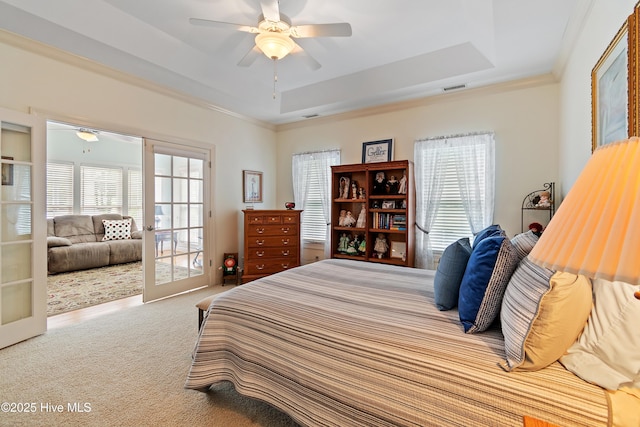 3254 Beaver Creek Dr SE, Southport, NC 28461 - bedroom featuring a raised ceiling, carpet floors, ornamental molding, ceiling fan, and access to outside