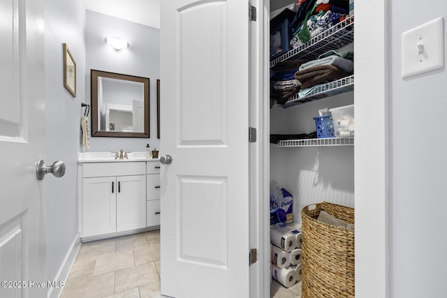 452 Crows Nest Ln, Sneads Ferry, NC 28460 - bathroom with vanity and baseboards