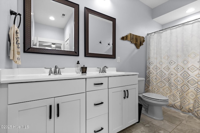 452 Crows Nest Ln, Sneads Ferry, NC 28460 - full bath with double vanity, toilet, recessed lighting, and curtained shower