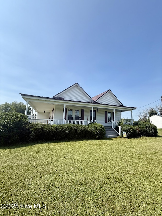 5934 NC-42, Macclesfield, NC 27852 - farmhouse inspired home with covered porch and a front yard