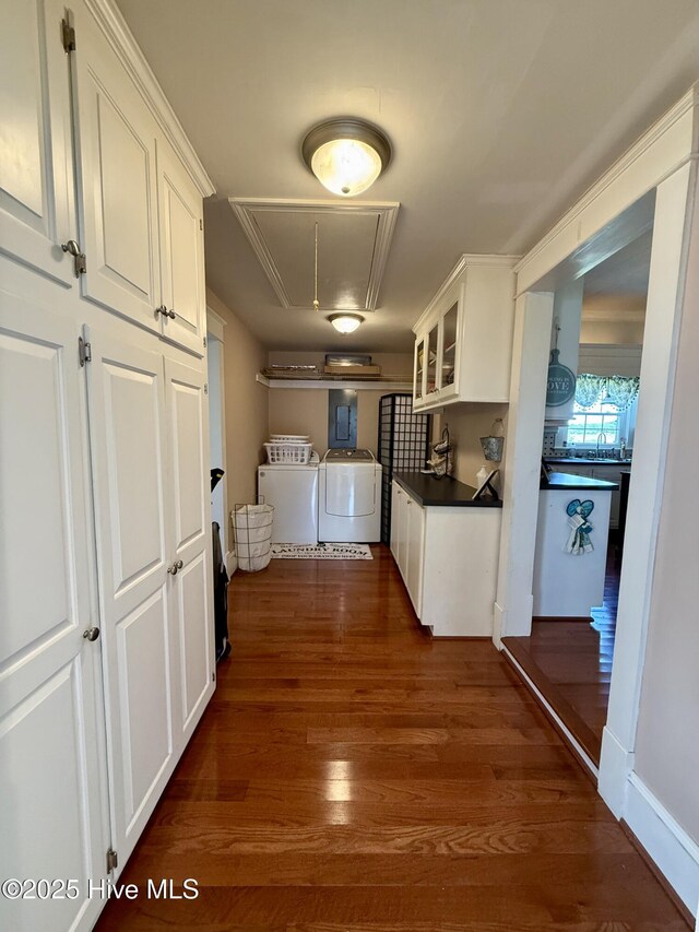 5934 NC-42, Macclesfield, NC 27852 - kitchen featuring separate washer and dryer, white cabinetry, dark wood-style floors, glass insert cabinets, and dark countertops
