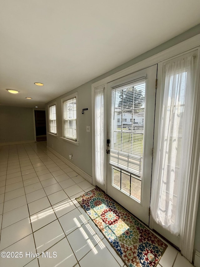 5934 NC-42, Macclesfield, NC 27852 - entryway with light tile patterned floors, plenty of natural light, baseboards, and recessed lighting