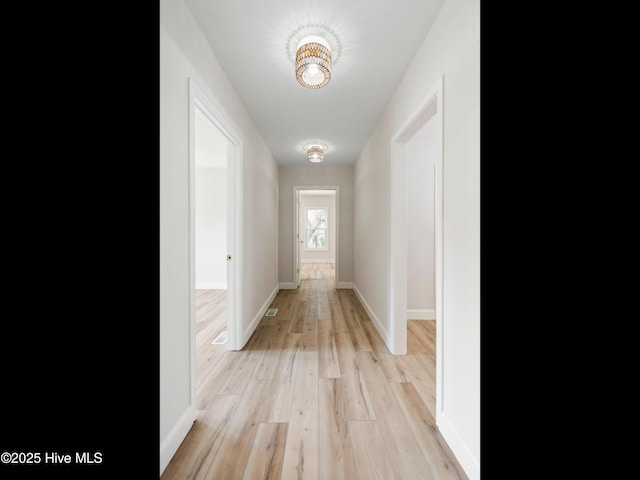 109 Inlet Ct, Hampstead, NC 28443 - hall featuring light wood-style flooring and baseboards