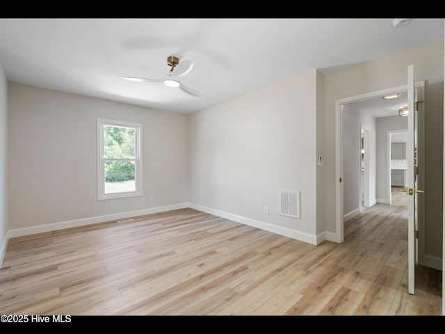 109 Inlet Ct, Hampstead, NC 28443 - empty room featuring a ceiling fan, light wood-style flooring, baseboards, and a smoke detector