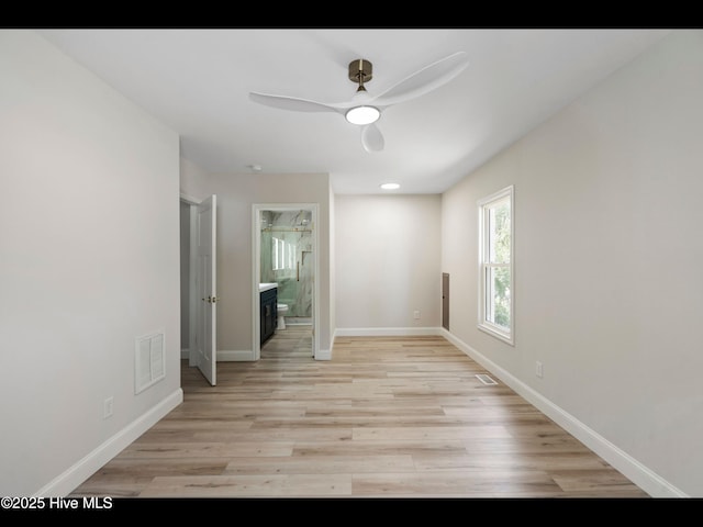 109 Inlet Ct, Hampstead, NC 28443 - spare room featuring a ceiling fan, baseboards, and light wood-style floors