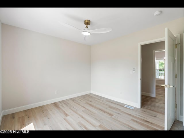 109 Inlet Ct, Hampstead, NC 28443 - spare room featuring light wood-style floors, a smoke detector, baseboards, and a ceiling fan