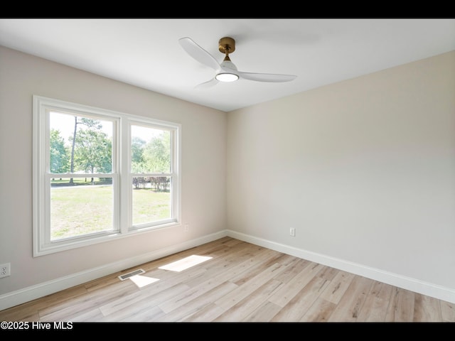 109 Inlet Ct, Hampstead, NC 28443 - spare room with light wood-style floors, baseboards, and ceiling fan
