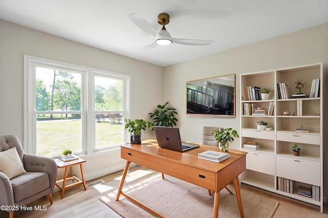 109 Inlet Ct, Hampstead, NC 28443 - home office featuring ceiling fan, light wood-style floors, and baseboards
