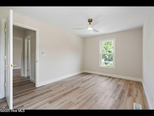 109 Inlet Ct, Hampstead, NC 28443 - spare room featuring ceiling fan, light wood-style flooring, and baseboards