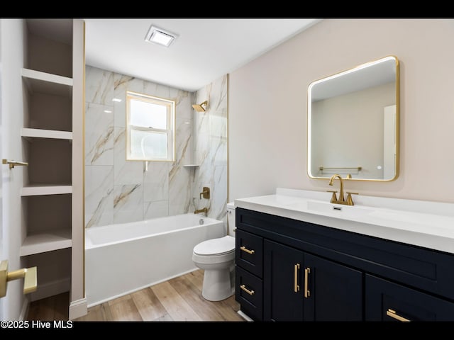 109 Inlet Ct, Hampstead, NC 28443 - full bathroom featuring toilet, vanity, wood finished floors, and bathtub / shower combination