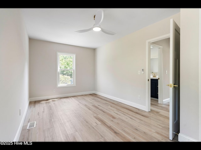 109 Inlet Ct, Hampstead, NC 28443 - spare room featuring light wood finished floors, a ceiling fan, and baseboards