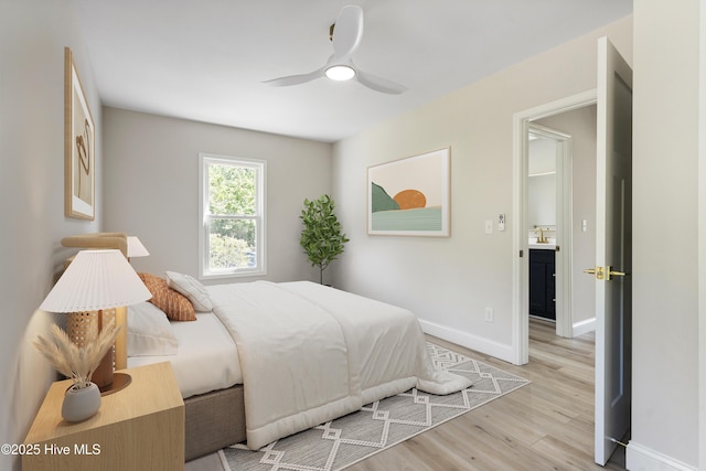 109 Inlet Ct, Hampstead, NC 28443 - bedroom with light wood-style flooring, baseboards, and a ceiling fan