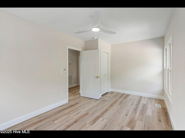 109 Inlet Ct, Hampstead, NC 28443 - spare room with light wood finished floors, ceiling fan, and baseboards