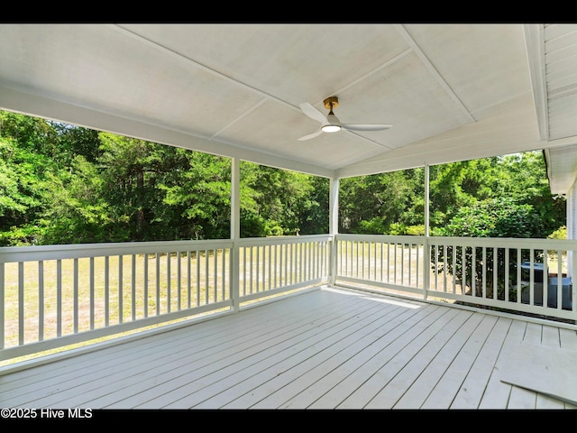 109 Inlet Ct, Hampstead, NC 28443 - wooden deck with a ceiling fan and view of scattered trees