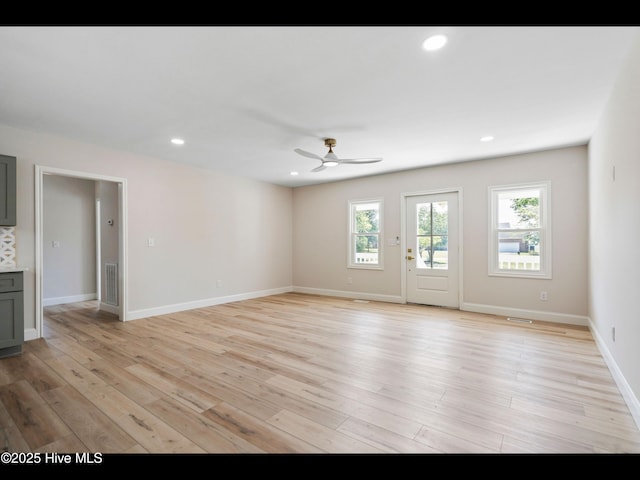109 Inlet Ct, Hampstead, NC 28443 - unfurnished living room with ceiling fan, light wood finished floors, baseboards, and recessed lighting