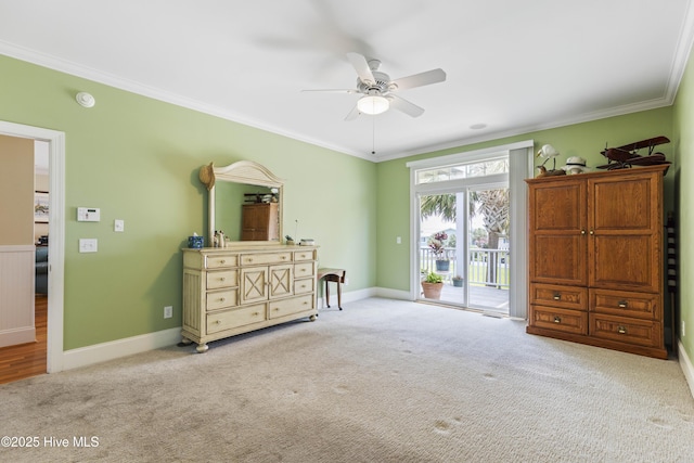 209 Georgia Ave, Carolina Beach, NC 28428 - carpeted bedroom with access to exterior, ornamental molding, baseboards, and a ceiling fan