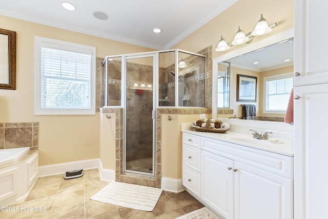 209 Georgia Ave, Carolina Beach, NC 28428 - bathroom featuring vanity, a stall shower, ornamental molding, a bath, and baseboards