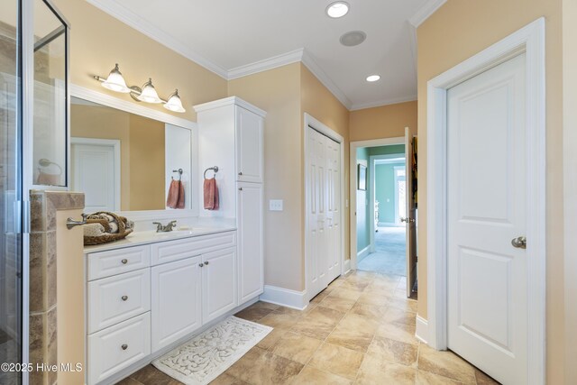 209 Georgia Ave, Carolina Beach, NC 28428 - bathroom with vanity, ornamental molding, a stall shower, baseboards, and recessed lighting