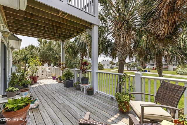 209 Georgia Ave, Carolina Beach, NC 28428 - wooden deck with a lawn