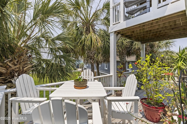 209 Georgia Ave, Carolina Beach, NC 28428 - view of patio / terrace with outdoor dining area and a balcony