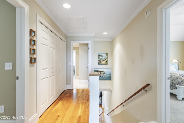 209 Georgia Ave, Carolina Beach, NC 28428 - corridor featuring an upstairs landing, recessed lighting, light wood-style floors, crown molding, and baseboards