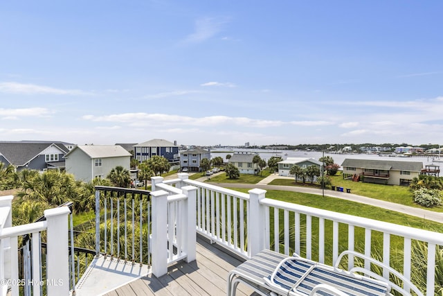 209 Georgia Ave, Carolina Beach, NC 28428 - wooden deck with a residential view and a yard