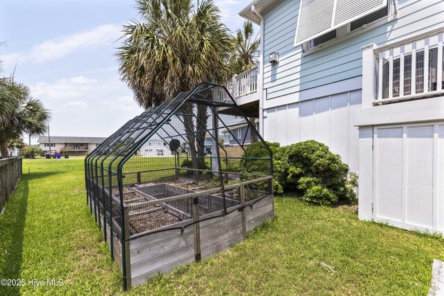209 Georgia Ave, Carolina Beach, NC 28428 - view of grassy yard with a vegetable garden